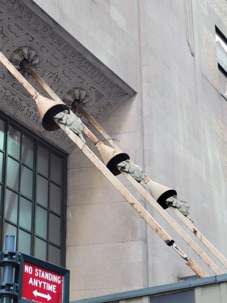 Close up of the Rat sculptures climibing the mooring lines at the Graybar Passage Entrance