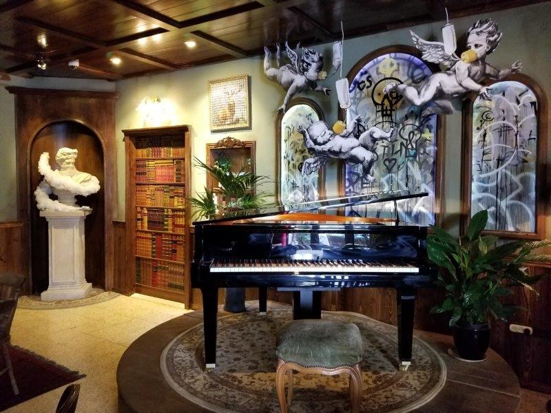 Piano surrounded by original pieces