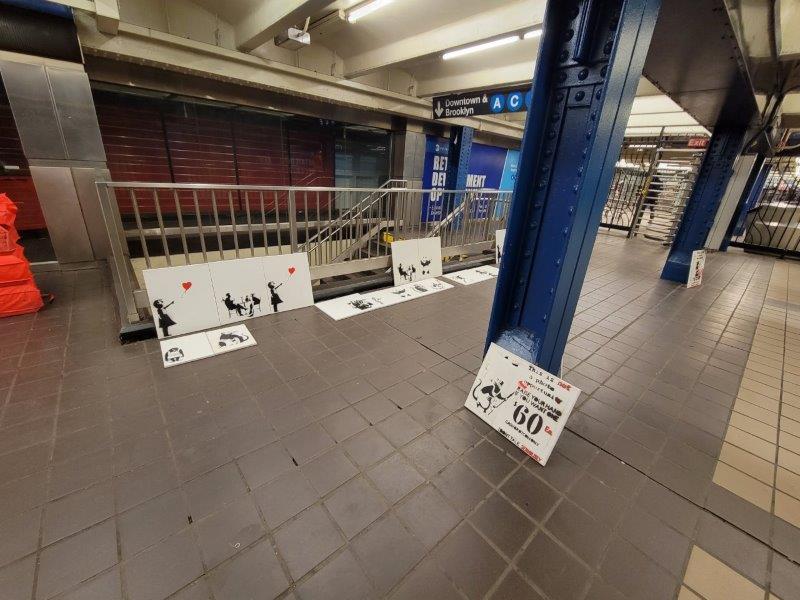 Art being sold at the 42nd Street Subway Station