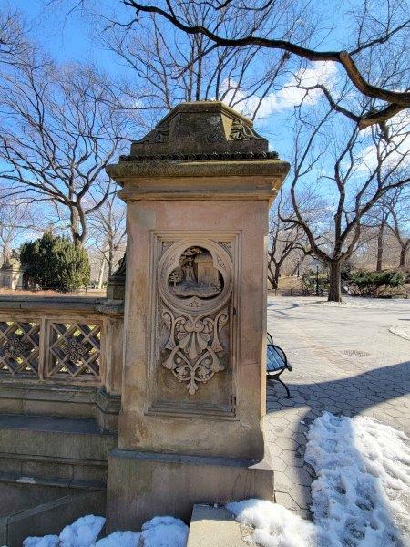 Pillars in Bethesda Terrace with representations of day 