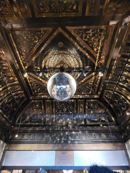 Disco ball on the decorative Studio 54 Broadway Theater ceiling