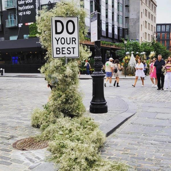 Do Your Best floral installation with white flowers by Lewis Miller 