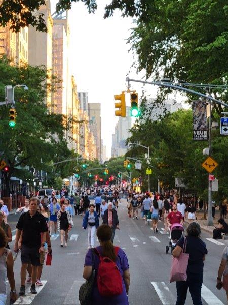 Museum Mile Festival on Fifth Avenue in NY with the streets closed off to traffic and full of people