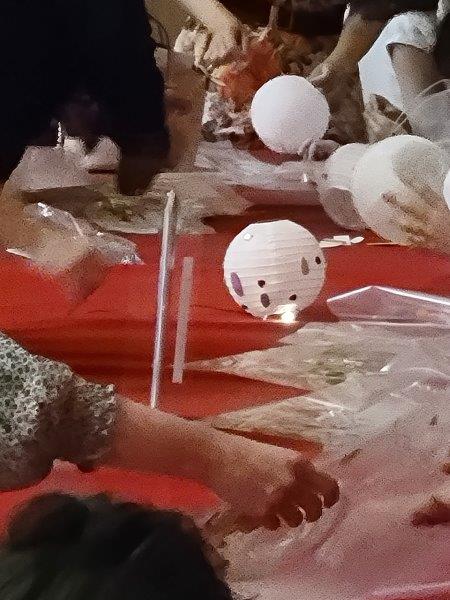 Table with lantern making activities for kids