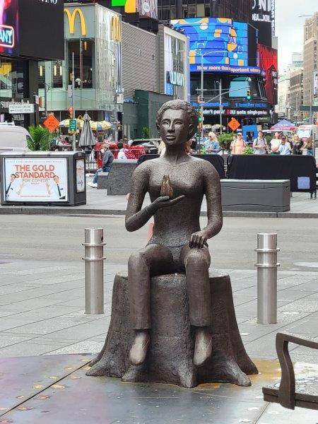 Lorraine Hansberry as pictured in the sculpture To Sit A While by Alison Saar