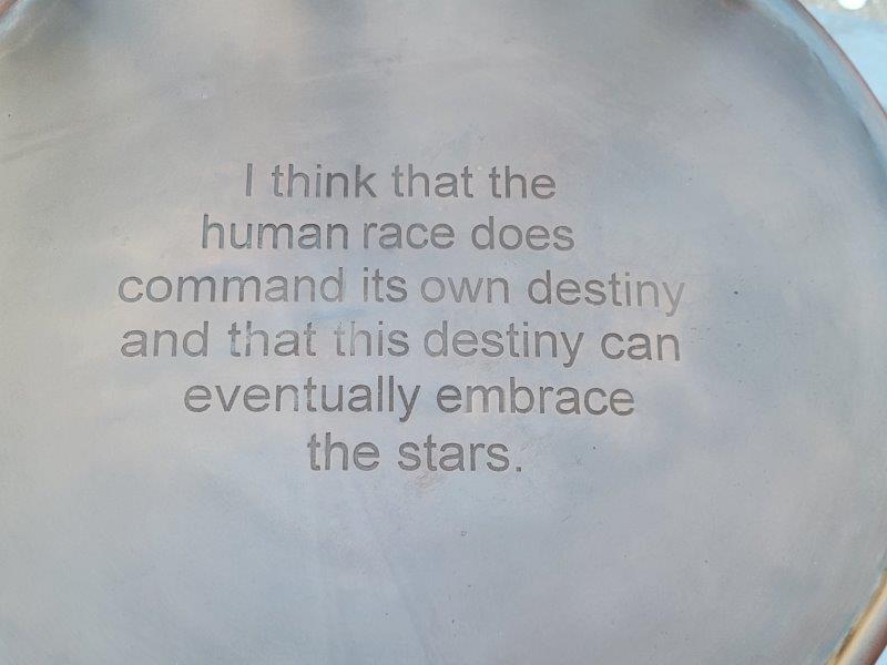 Chair inscription - "I think that the human race does command its own destiny and that this destiny can eventually embrace the stars."