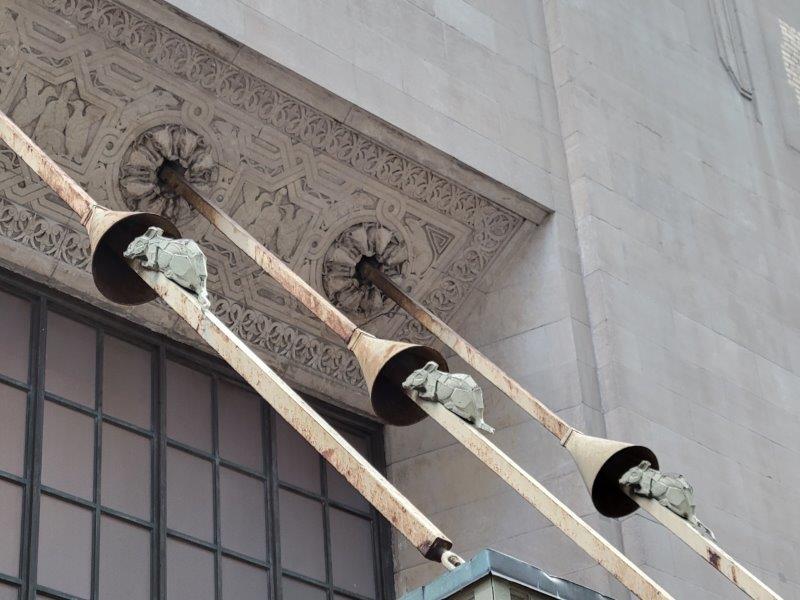 Mooring lines with cast iron rats sculptures at at Grand Central entrance at Graybar passage 