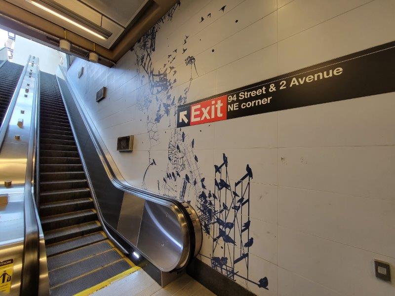 Bottom of the escalator at 94th Street and 2nd Ave