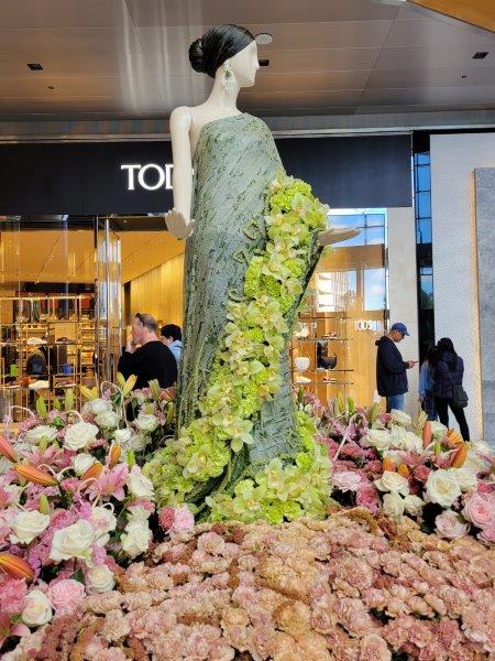 Jennifer Lopez Floral Mannequin of a green dress