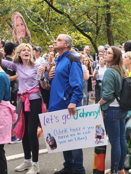 Marathon Spectators with funny signs 