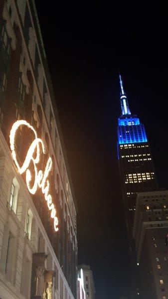 Giant Believe lettering on the side of Macys with ESB in the background 