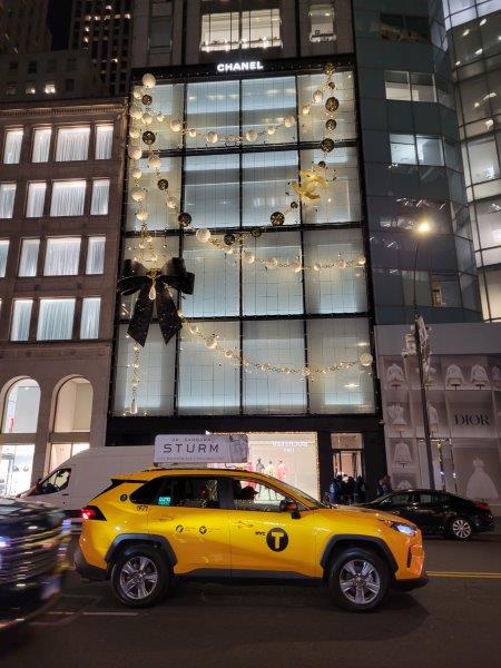 Chanel store on 57th Street wearing its signature necklace