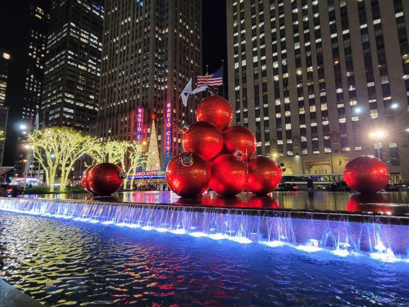 Giant holiday ornament display on Sixth Avenue