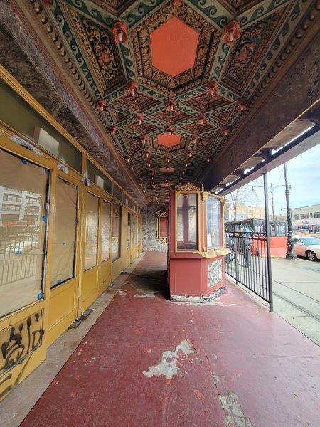 Streetside awning with a stunning ceiling