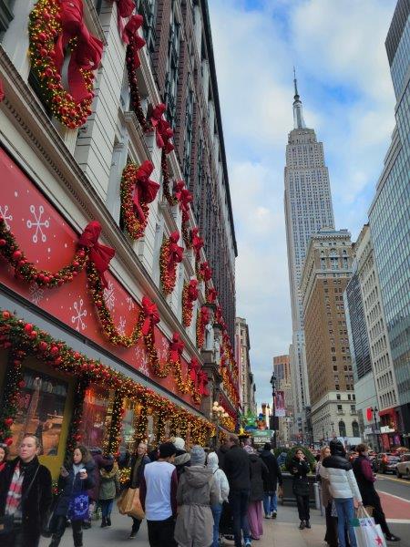 Macys decorations on 34th Street with Empire State Building in the background