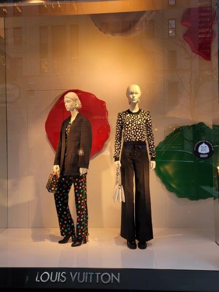 Kusama inspired collection worn by mannequins in Louis Vuitton windows  