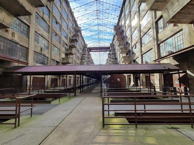 Sunlight pouring into Building B Atrium with staggered balconies on both sides