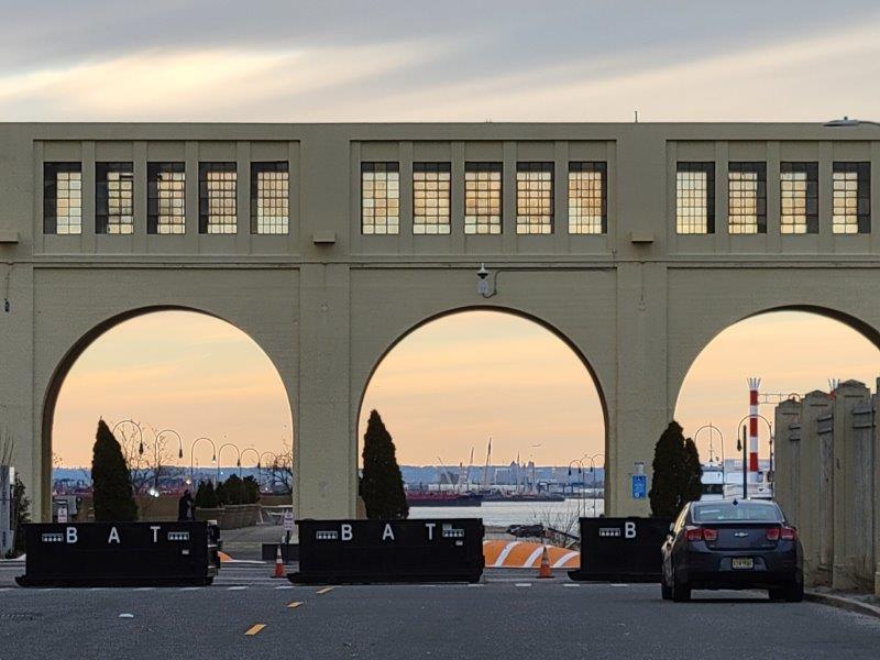 Ferry terminal and cargo ships through the arches