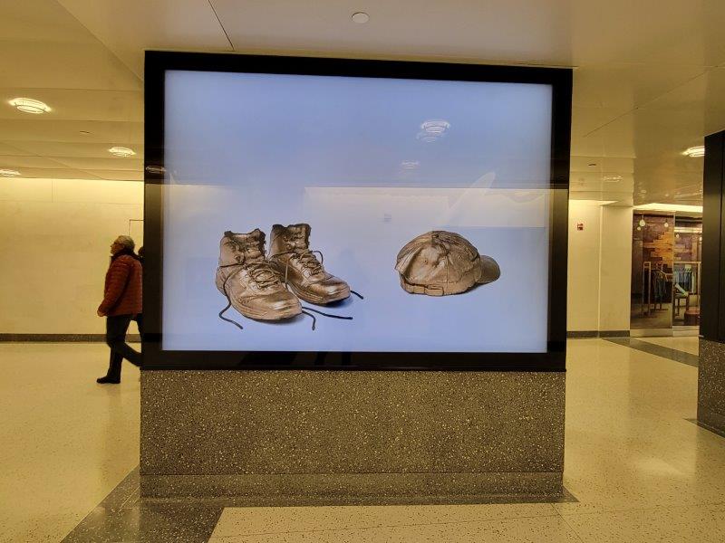 Da Gold Man's shoes and hat as part of the exhibit 