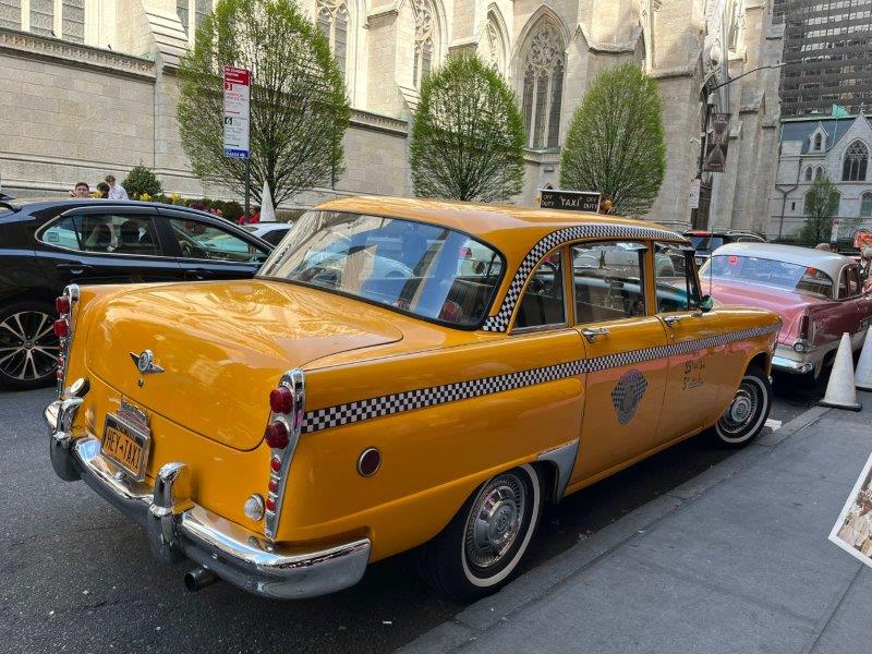 Iconic vintage yellow taxi on the streets