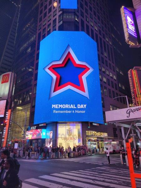 Times Square - Remember and Honor billboard