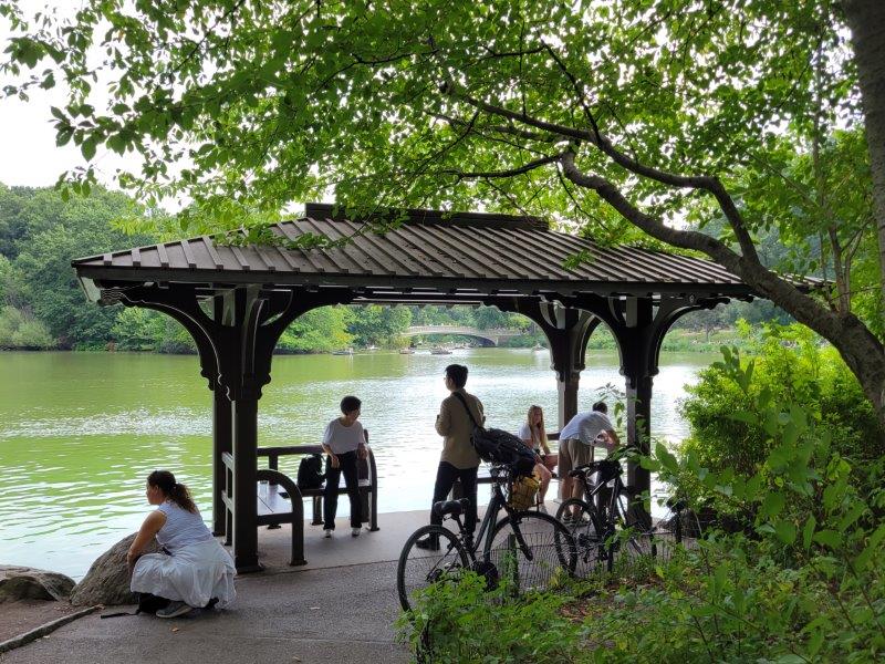 Seating at a pavilion along the lake in Central Park