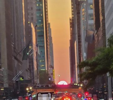 View of setting sun on Manhattanhenge in May 2023