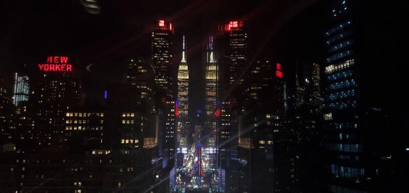 Reflection of Empire State Building by night