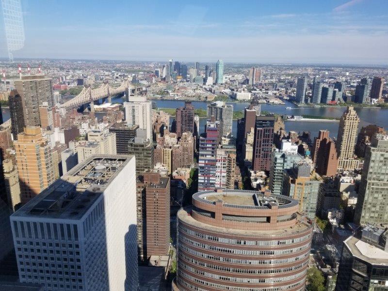 Looking down at the Skyscrapers in Midtown East in Manhattan with the East River in the background