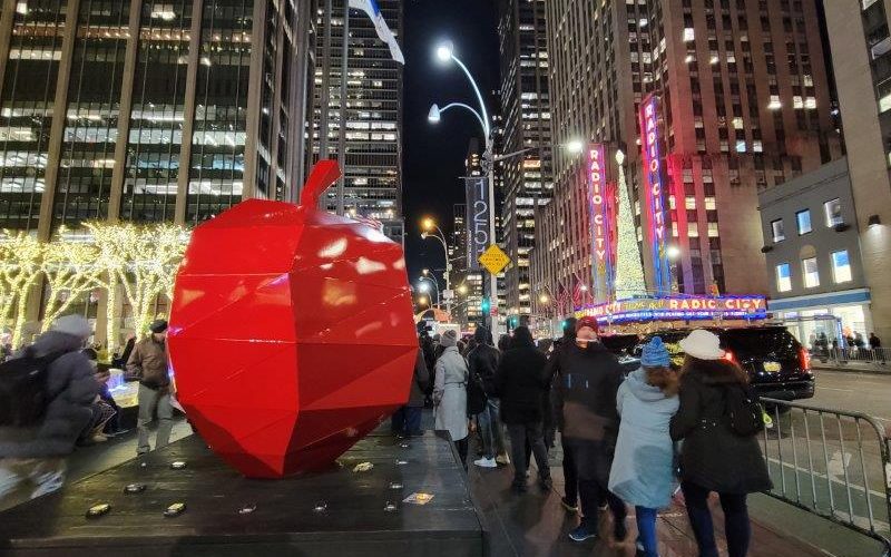 Apple Sculpture on Sixth Avenue with Radio City Music Hall in the background