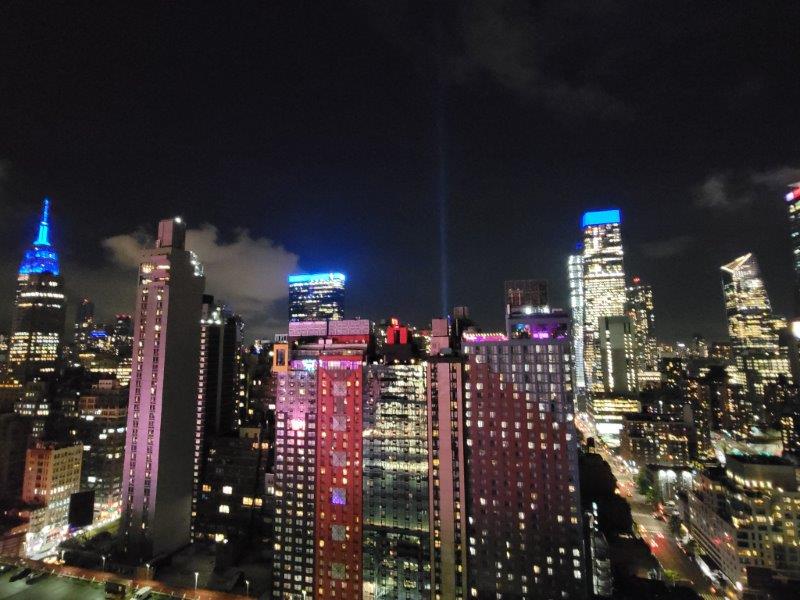 New York skyline all lit up in blue on 9/11 including the Empire State Building