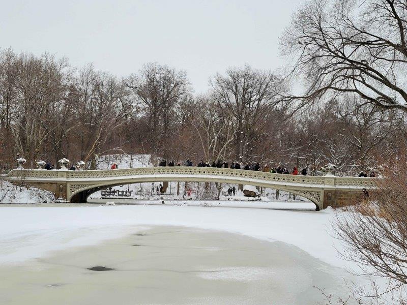 Bow Bridge in the winter over a frozen Central Park Lake