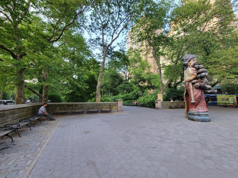 Backless benches at Grand Army Plaza along the east perimeter of Central Park