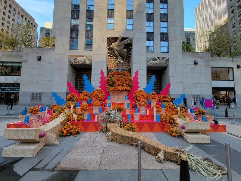 Massive Day of the Dead Ofrenda with pink and blue accents at Rockfeller Center