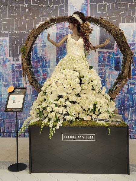 Bermuda mannequin all dressed up in white flowers