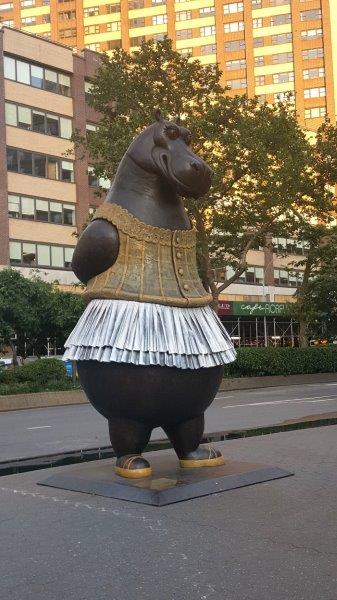 Hippo Ballerina scuplture of a standing hippo wearing a tutu at Dante Park outside Lincoln Center