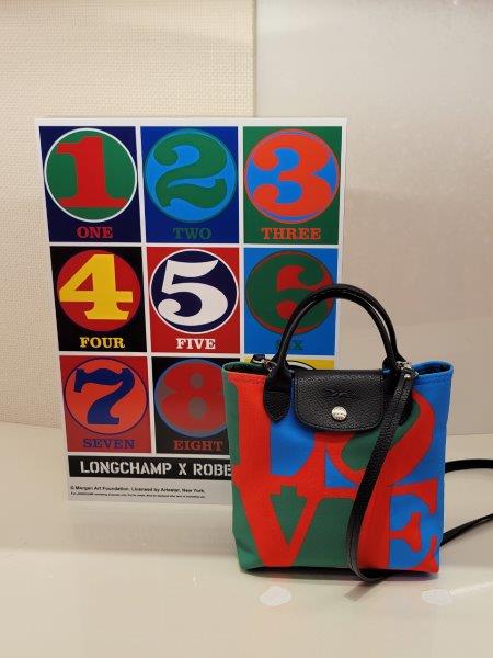 Displays featuring numbers and Love at the Longchamp store