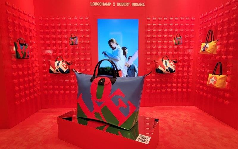 Longchamp x Robert Indiana collaboration at the Fifth Avenue flagship store