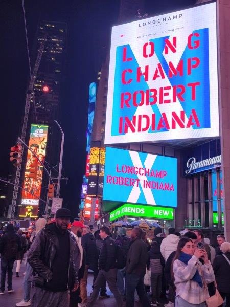 Long Champ x Robert Indiana ads in Times Square