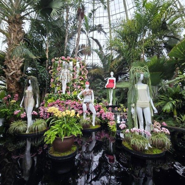 2024 Orchid Show - Florals in Fashion at NYBG featuring mannequins all dressed up in orchids