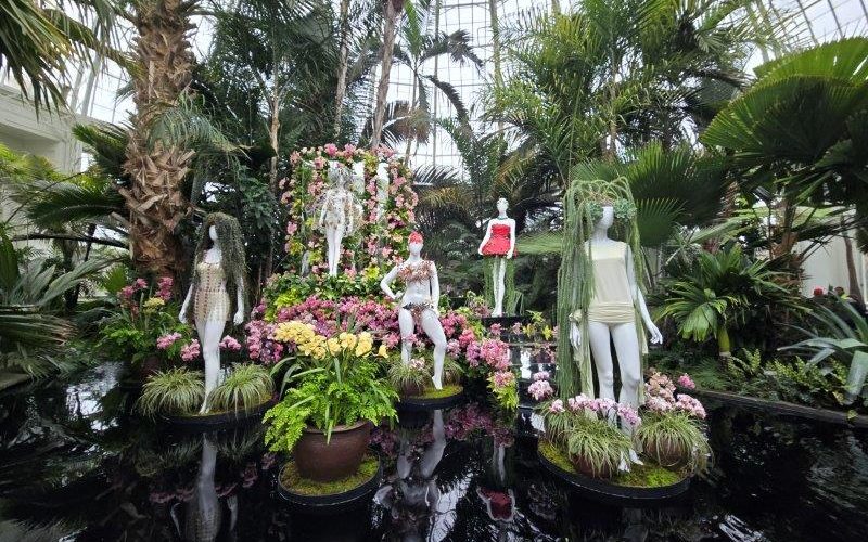 2024 Orchid Show - Florals in Fashion at NYBG featuring mannequins all dressed up in orchids