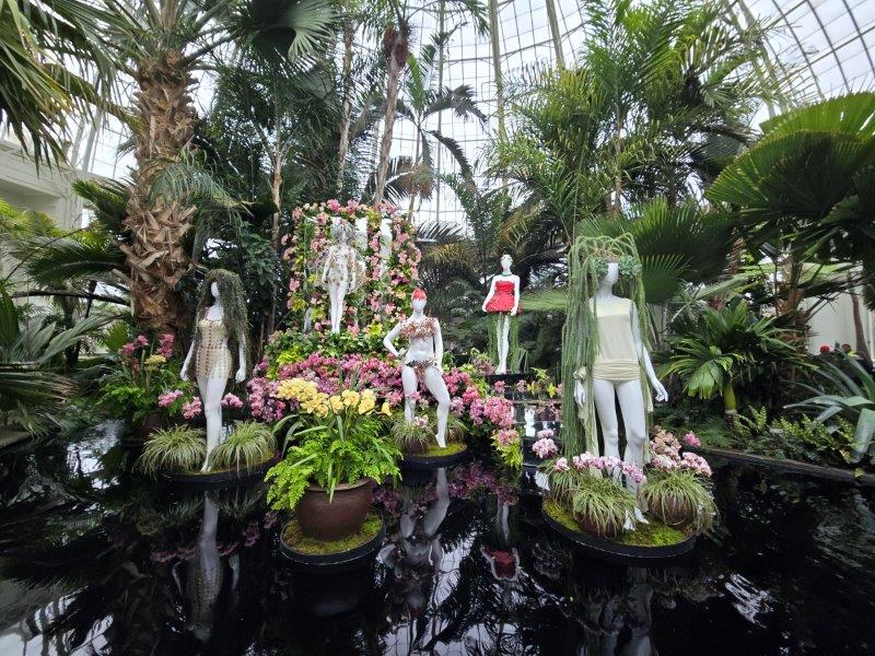 2024 Orchid Show - Florals in Fashion at NYBG featuring mannequins all dressed up in orchids