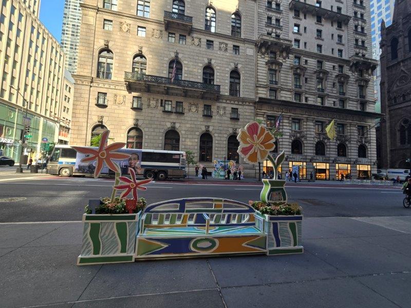 Bench for seating within a Fifth Avenue Blooms installation